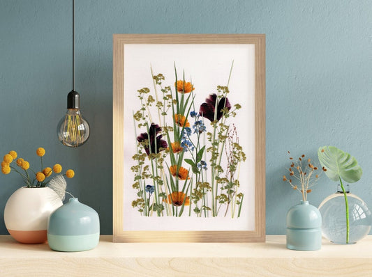 Dried flowers arrangement in wooden frame